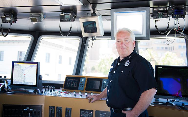 Image of San Francisco Fireboat Engineer standing inside of the City's Fireboat 