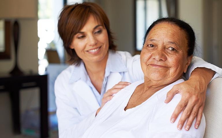 nurse comforting patient 