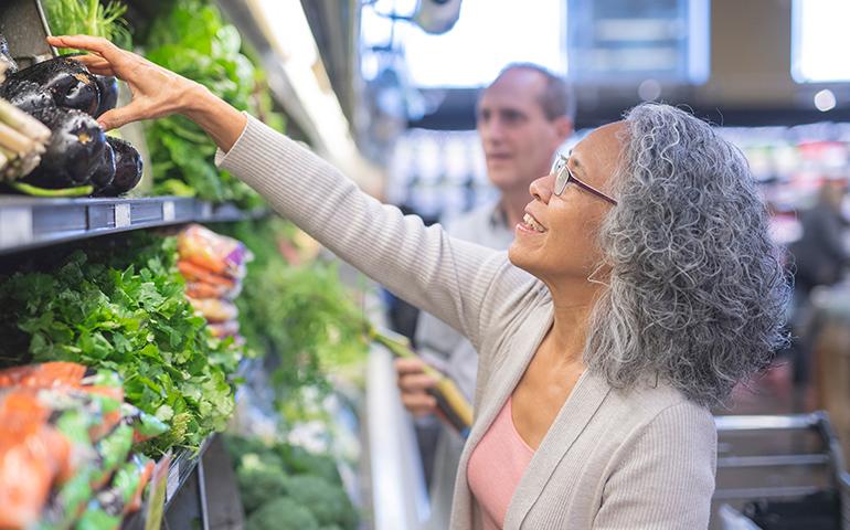 woman shopping for produce