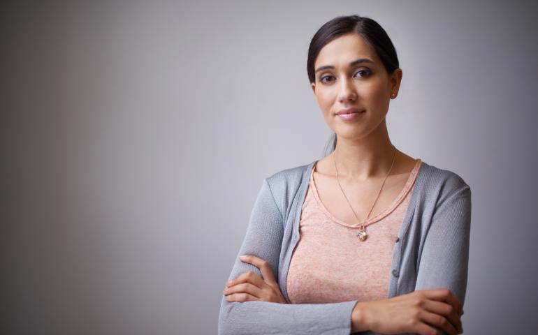 woman standing with arms crossed