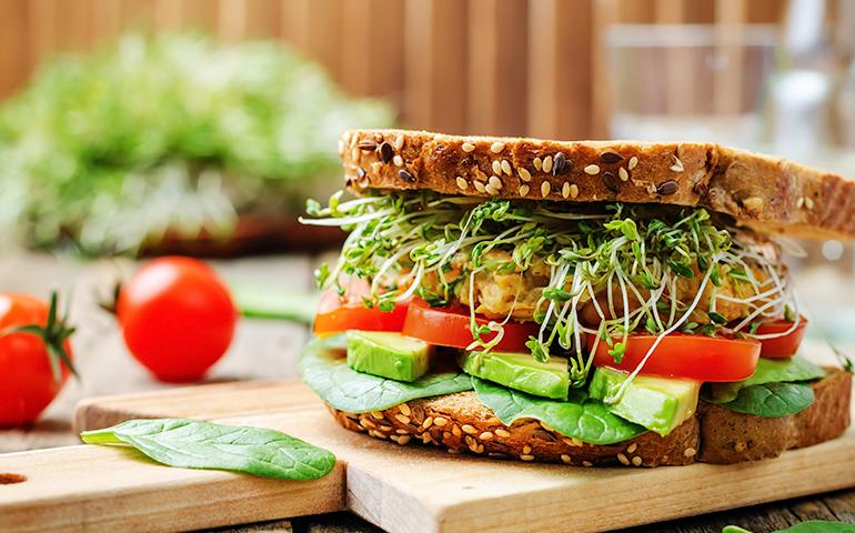 Avocado, sprout and tomato sandwich