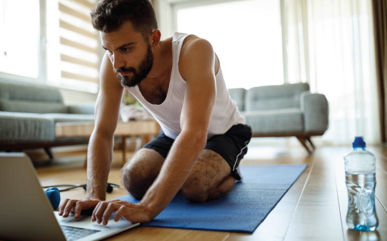 guy planning a fitness class online