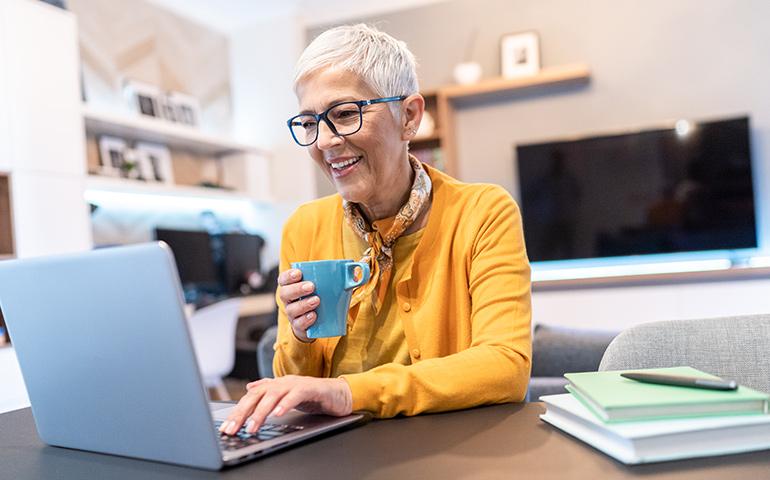 older woman on laptop