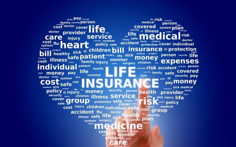 Life Insurance image of a heart filled with words about insurance and a finger pointing to the center