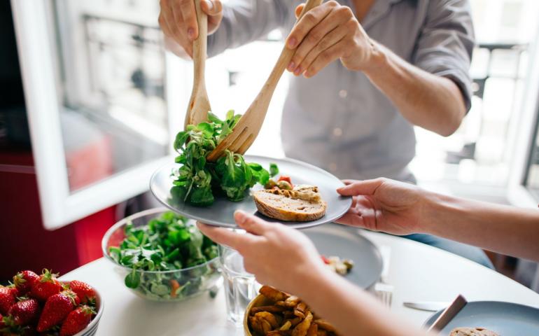 Serving a plate of salad