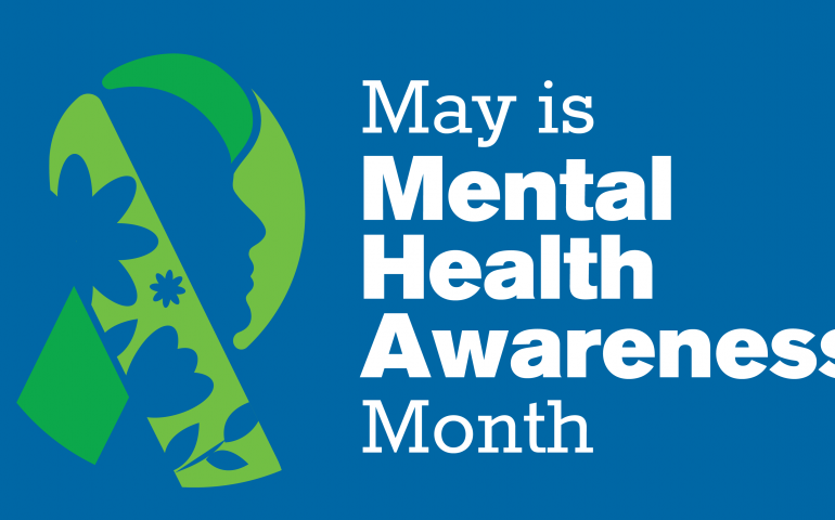 Mental Health Awareness Banner with green ribbon with flowers, silhouette of a face and the words May is Mental Health Awareness Month