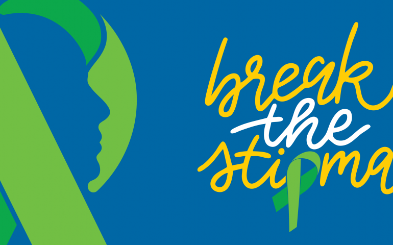 Mental Health Awareness Banner with green ribbon, silhouette of a face and the words Break the Stigma