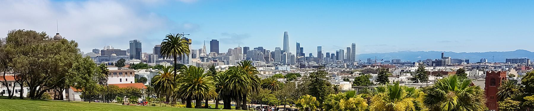 Panoramic Skyline of San Francisco as seen from top of Dolores Park. 